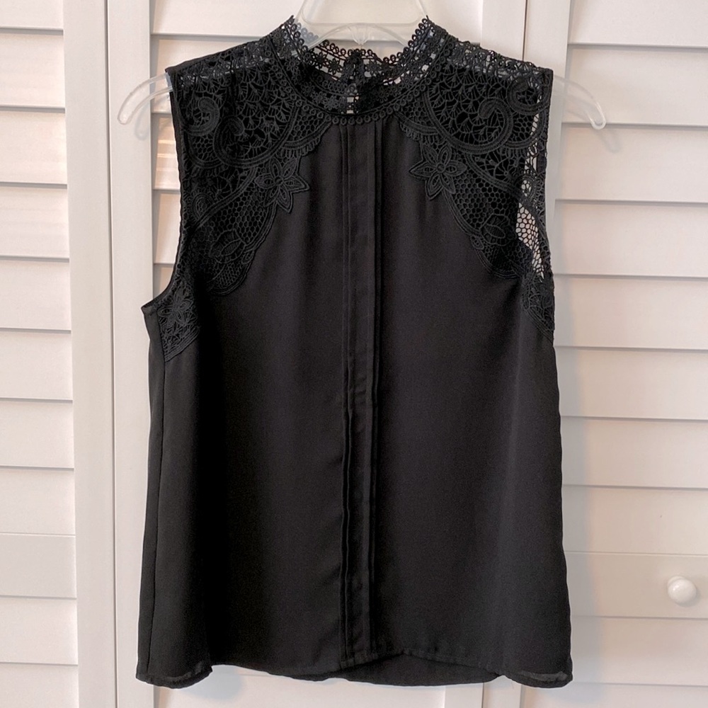 Black sleeveless top with lace details